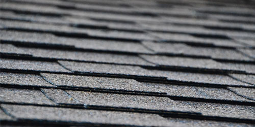 Close up of asphalt shingles on a home